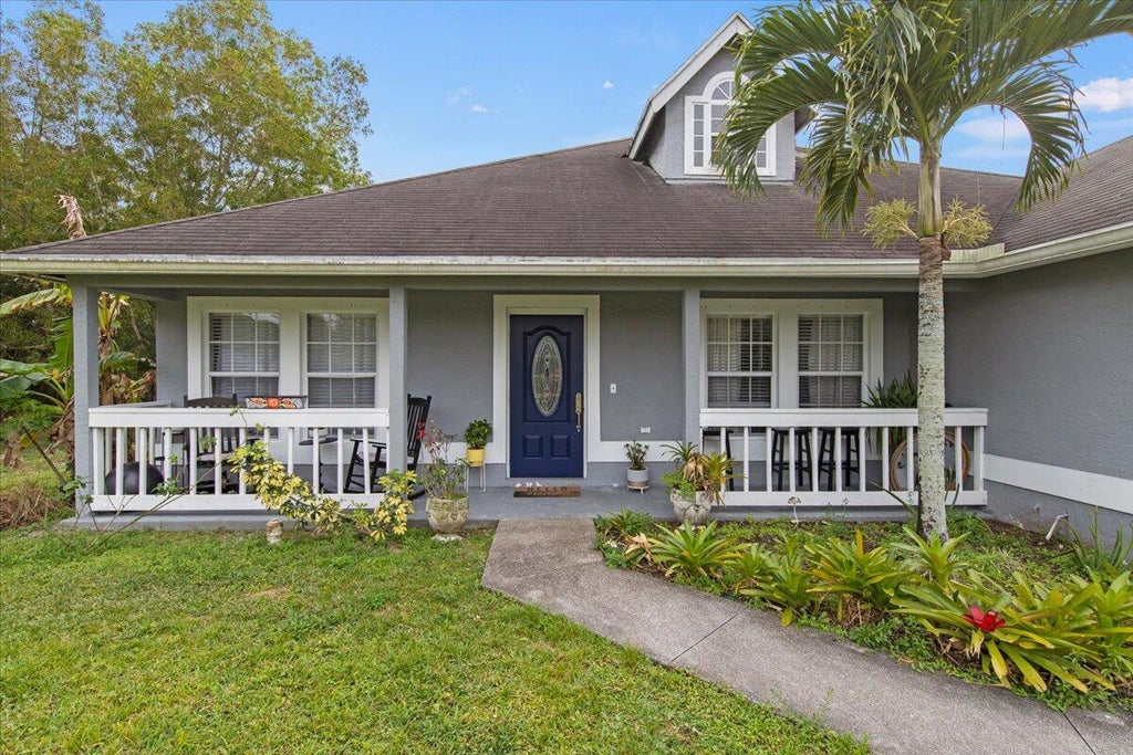 Photo of 14870 76th Road N, Loxahatchee, FL 33470 (MLS # R10965638)
