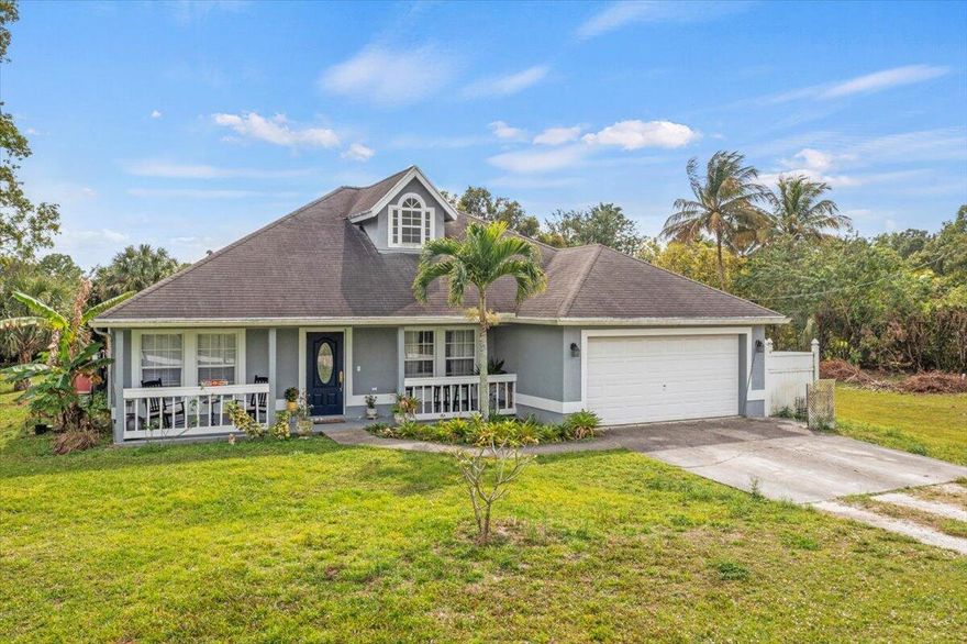 Welcome to your country oasis in Loxahatchee! This charming 4-bedroom, 2-bathroom home sits on over one acre with no HOA, providing the freedom to bring your horses and other animals. The property features a full fence for privacy and security. With 1750 square feet of living space, this home offers a cozy yet spacious atmosphere. Embrace the tranquility of rural living while enjoying the convenience of a well-maintained property that welcomes your furry friends. Don't miss this rare opportunity for a peaceful retreat with ample space to make it your own!