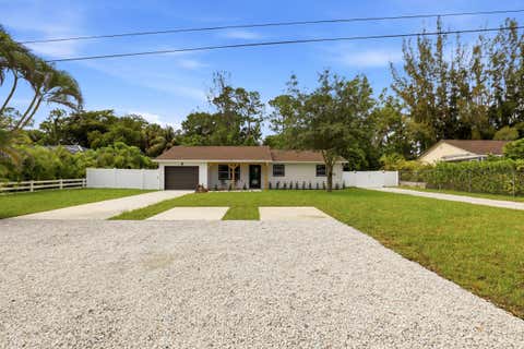 Photo of 15409 Los Angeles Drive, Loxahatchee Groves, FL 33470 (MLS # B26036316)