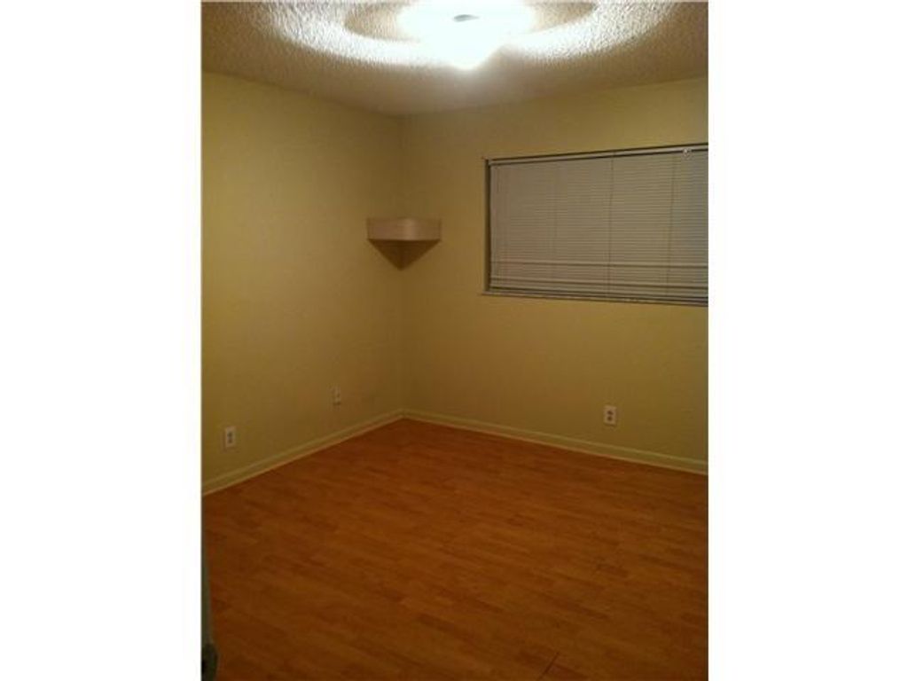 Photo of 3029 Riverside Drive #215, Coral Springs, FL 33065 (MLS # F10429325)