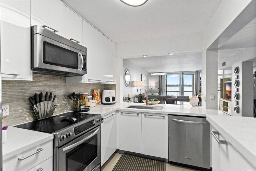 Start your day with lakefront views and end it with sunsets from your screened balcony—this stylish 2BD/2BA first-floor condo at Lake Emerald is your private slice of paradise. With marble floors, impact windows, a sleek kitchen, and a split layout, comfort meets charm. Your dedicated parking spot is right outside the door—no stairs, no hassle. Step out and unwind like it’s your own backyard. Enjoy resort-style amenities: 3 pools, hot tubs, gym, tennis, pickleball, and more. 40-year inspection included a new roof in 2024, concrete restoration, stucco removal and replacement, repairing balconies, waterproofing and painting the building. Just 15 mins to beaches, dining, and the airport. Welcome home.