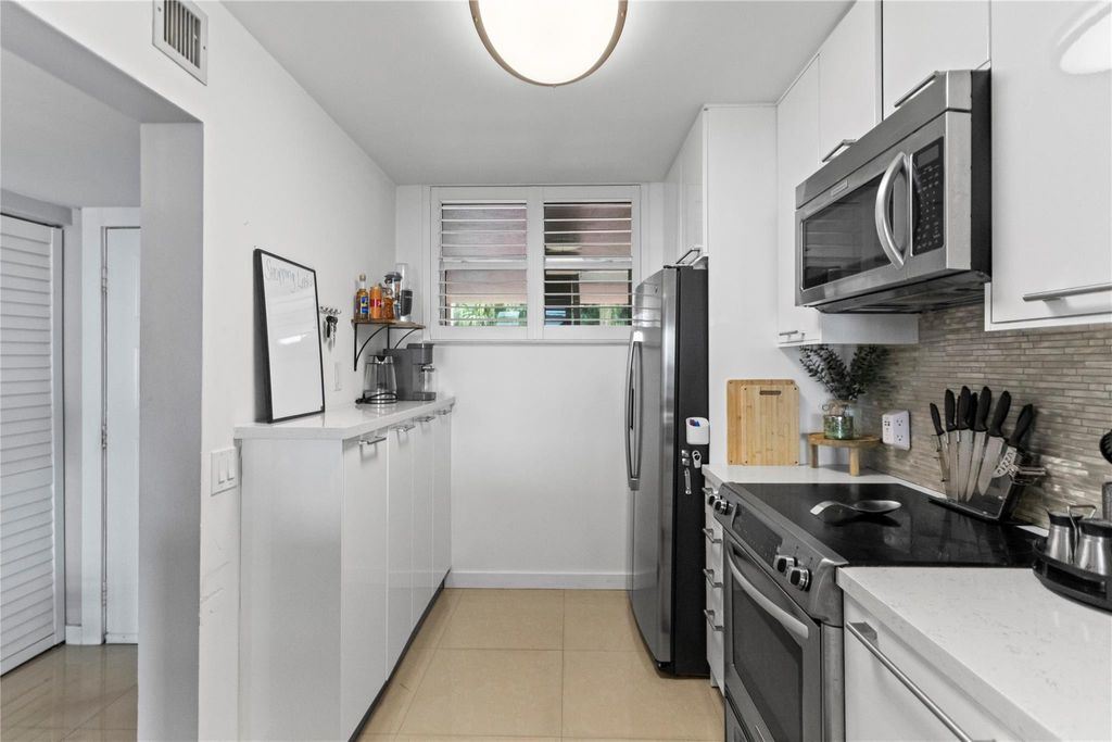 Photo of 111 Lake Emerald Drive #106, Oakland Park, FL 33309 (MLS # F10543176)