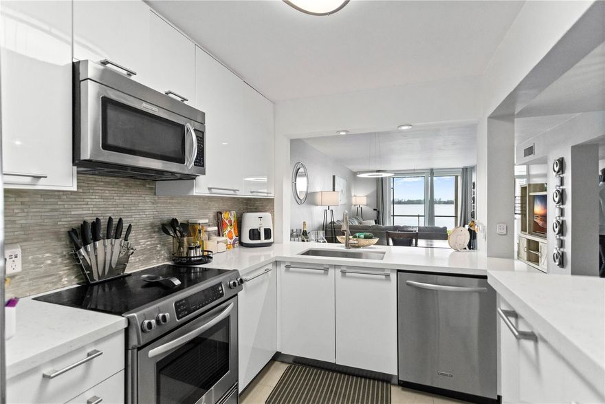 Start your day with lakefront views and end it with sunsets from your screened balcony—this stylish 2BD/2BA first-floor condo at Lake Emerald is your private slice of paradise. With marble floors, impact windows, a sleek kitchen, and a split layout, comfort meets charm. Your dedicated parking spot is right outside the door—no stairs, no hassle. Step out and unwind like it’s your own backyard. Enjoy resort-style amenities: 3 pools, hot tubs, gym, tennis, pickleball, and more. 40-year inspection included a new roof in 2024, concrete restoration, stucco removal and replacement, repairing balconies, waterproofing and painting the building. Just 15 mins to beaches, dining, and the airport. Welcome home.