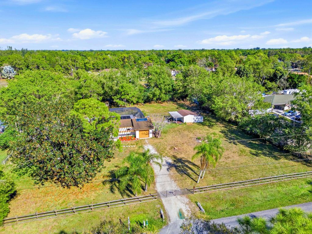 Photo of 16319 E Cheltenham Drive E, Loxahatchee, FL 33470 (MLS # R11145944)