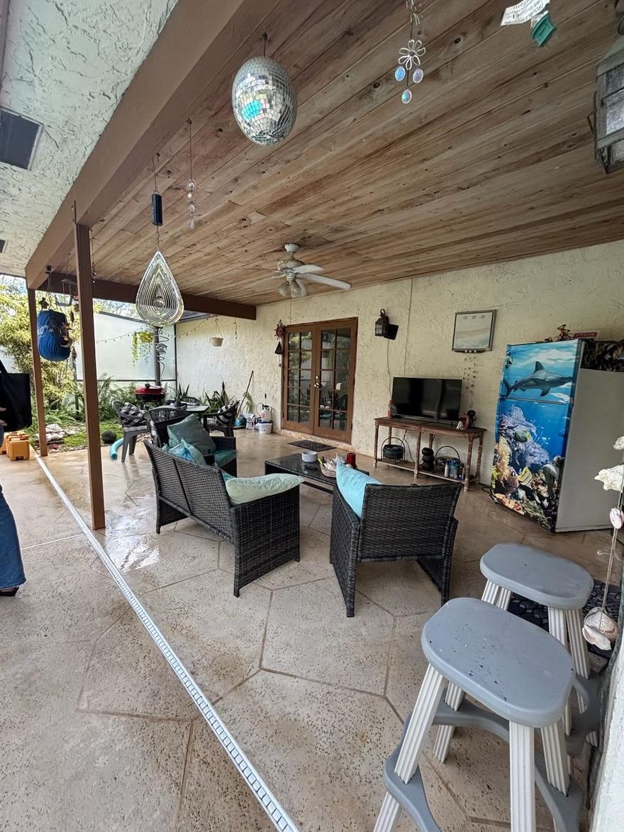 Discover true Loxahatchee living on this fully fenced acre+ property with no HOA--bring your RVs, boats, trailers, and animals. Set just minutes from great schools, shopping, and conveniences, this quiet, serene homesite offers incredible freedom. The property features a double gate, cross-fencing, 6 animal pens, a garden area, multiple water spigots, and a shed with electric. Enjoy a screened pool, spacious lanai, and peaceful natural surroundings. Home priced low- it needs a new roof. Cash only at this time; seller may consider installing a new roof with the right offer.Located in The Acreage, this property sits near top schools, parks, Publix, and dining, with easy access to main roads while still offering the peaceful, open feel this rural community is loved for. More Photos soon.