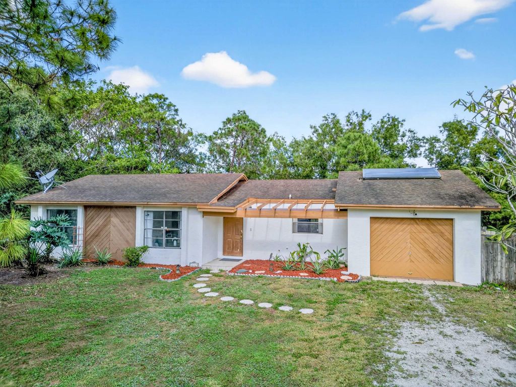 Photo of 16319 E Cheltenham Drive E, The Acreage, FL 33470 (MLS # R11145944)