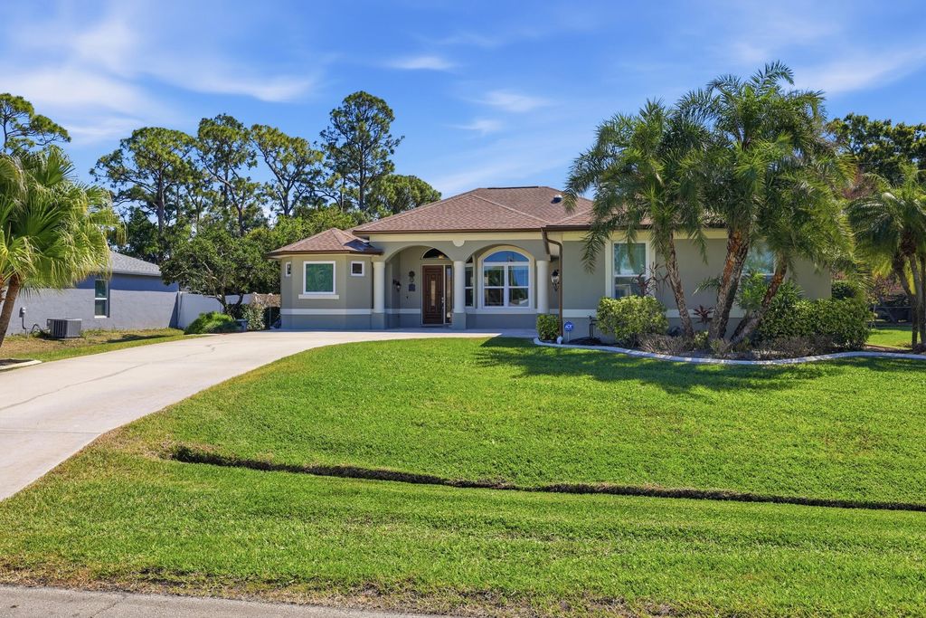 Photo of 1683 SW Realty Street, Port Saint Lucie, FL 34987 (MLS # B26006415)