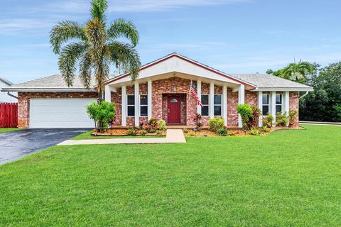 Single Family Residence in Sunrise FL 927 135th Way Way.jpg