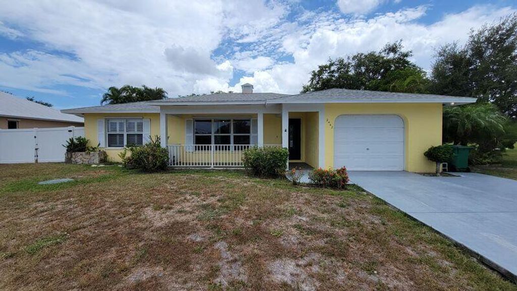 Photo of 2442 SE Grand Drive, Port Saint Lucie, FL 34952 (MLS # R10822627)
