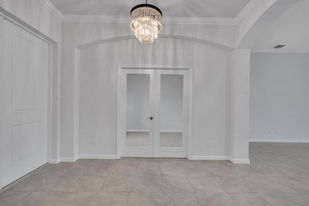 Photo of 1445 SW Leisure Lane, Port Saint Lucie, FL 34953 (MLS # R10943415)