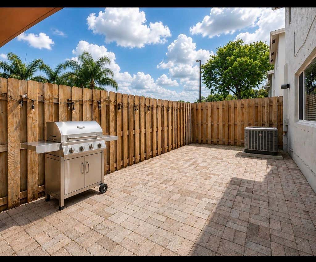 Photo of 9491 STANLEY Lane, Tamarac, FL 33321 (MLS # B26063638)