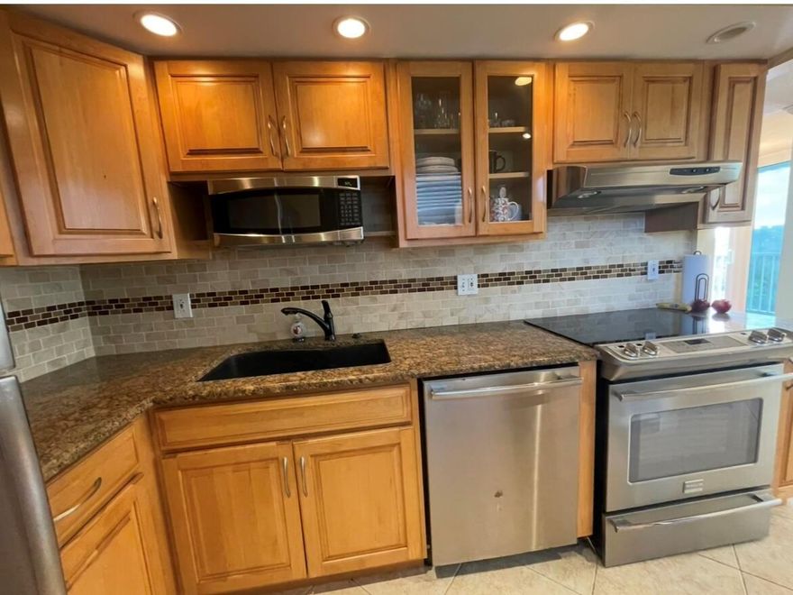 Tropic Bay Condo is a 55+ community and tenants must be approved by the HOA and agree to follow the rules and regulations of the Tropic Bay Association. This is a short-term furnished rental with a quiet pool, bbq grill, clubhouse and East of US1 location. From the living room you can see the canal leading towards the Intracoastal waterways and the pool area.