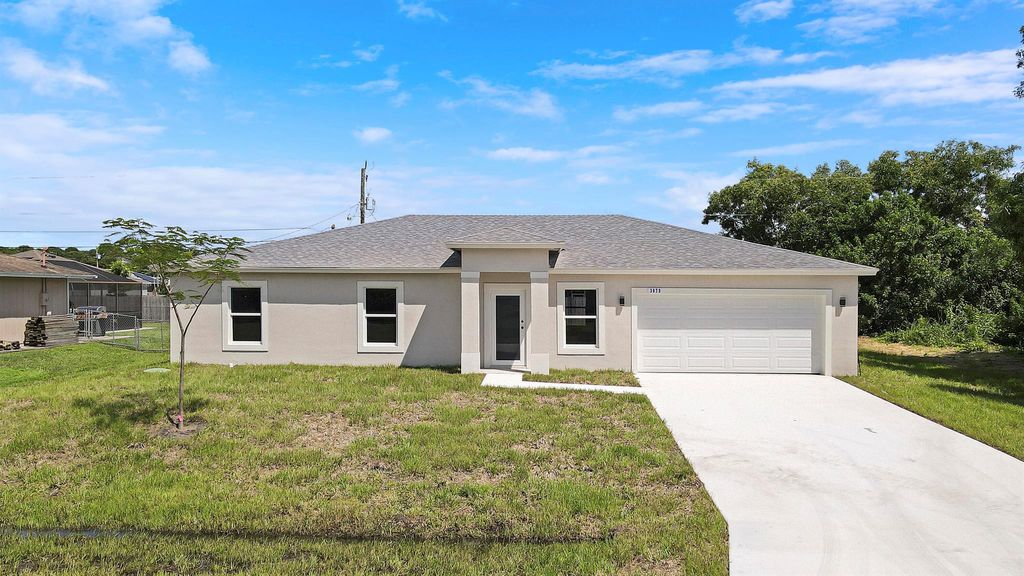 Photo of 3079 SW Segovia Street, Port Saint Lucie, FL 34953 (MLS # R11011459)