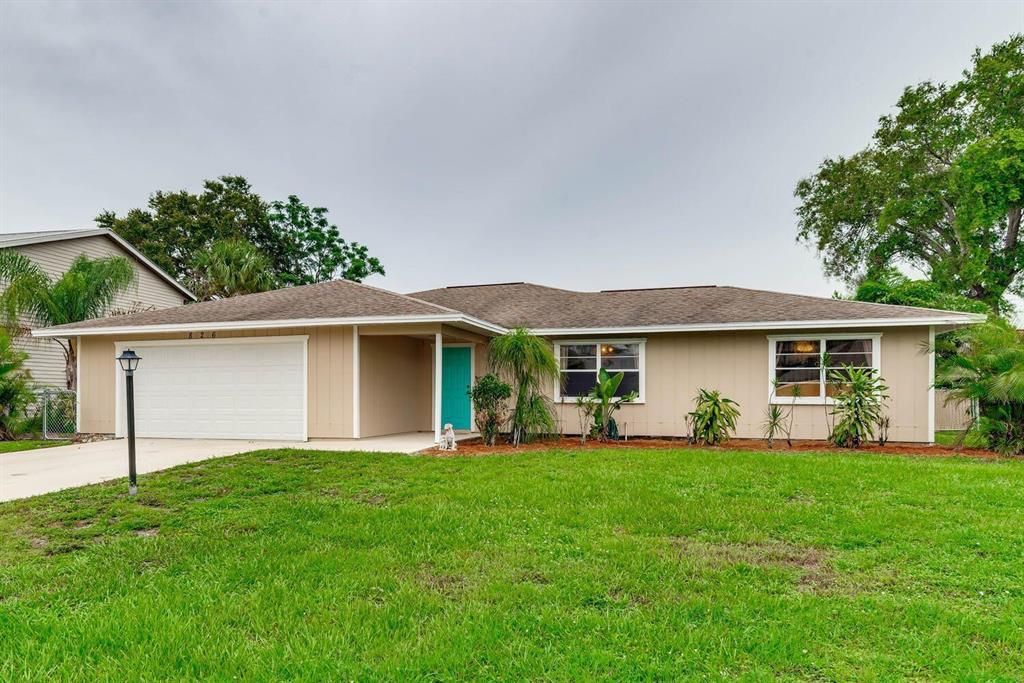 Photo of 826 NE Vanda Terrado, Jensen Beach, FL 34957 (MLS # R10731721)