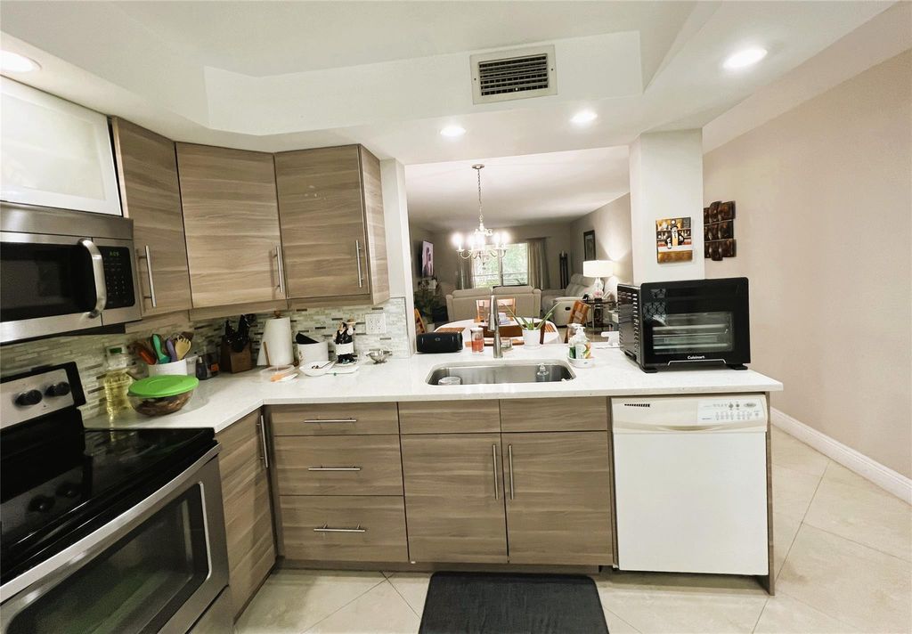 Photo of 3001 Portofino Isle #E-2, Coconut Creek, FL 33066 (MLS # F10549934)