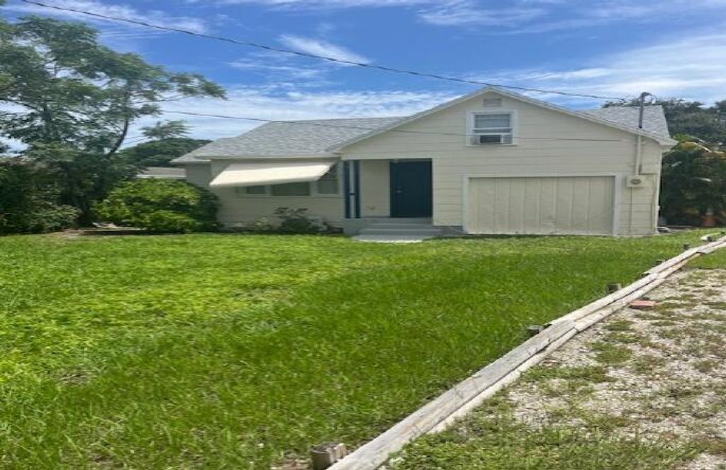 Photo of 1751 4th Avenue N, Lake Worth Beach, FL 33460 (MLS # R11053987)