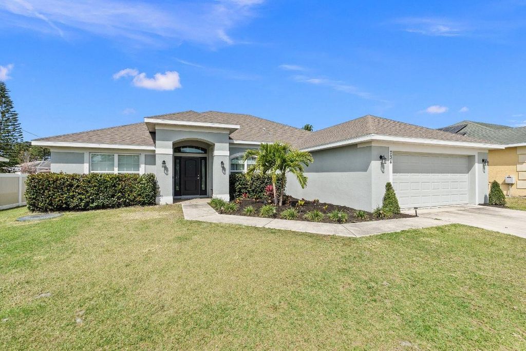 Photo of 734 NE Eastlake Street, Port Saint Lucie, FL 34983 (MLS # R10977873)