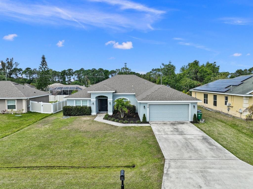 Photo of 734 NE Eastlake Street, Port Saint Lucie, FL 34983 (MLS # R10977873)