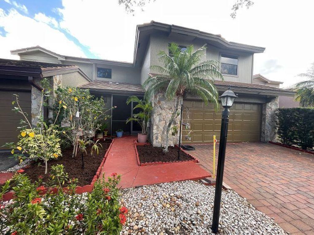 Photo of 5036 Cayenne Lane, Palm Beach Gardens, FL 33418 (MLS # R10894471)