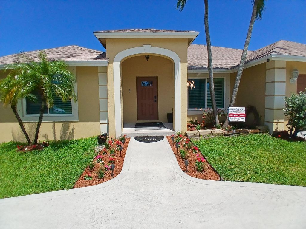 Photo of 6640 Plymouth Drive N, Lantana, FL 33462 (MLS # B26027320)
