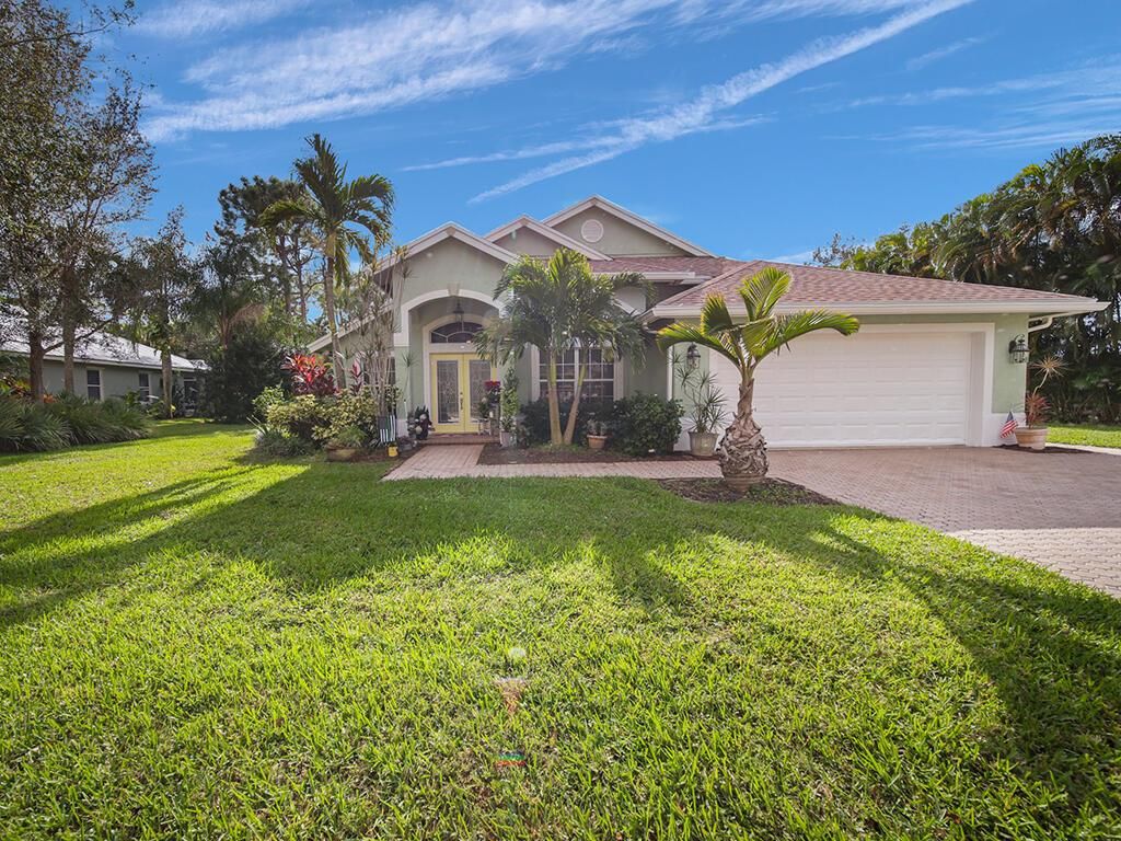 Photo of 8569 SW Sea Captain Drive, Stuart, FL 34997 (MLS # R10852164)