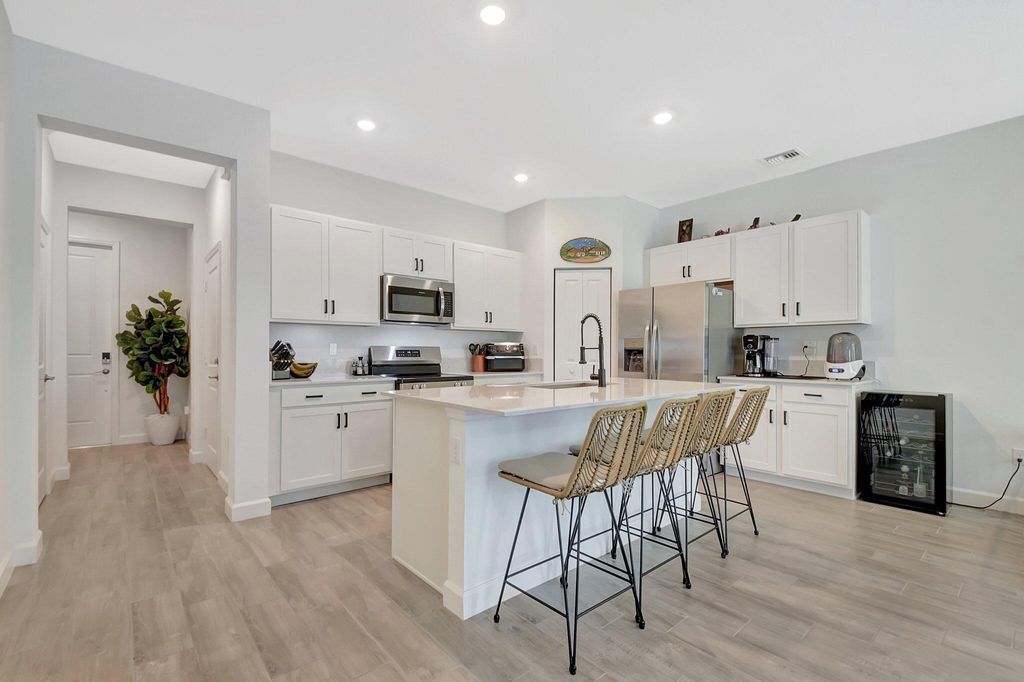 Photo of 4375 Hammock Grove Drive, Lake Worth, FL 33467 (MLS # R11096163)