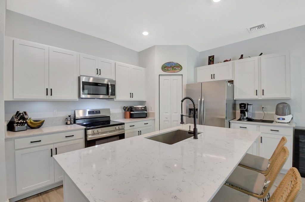 Photo of 4375 Hammock Grove Drive, Lake Worth, FL 33467 (MLS # R11096163)