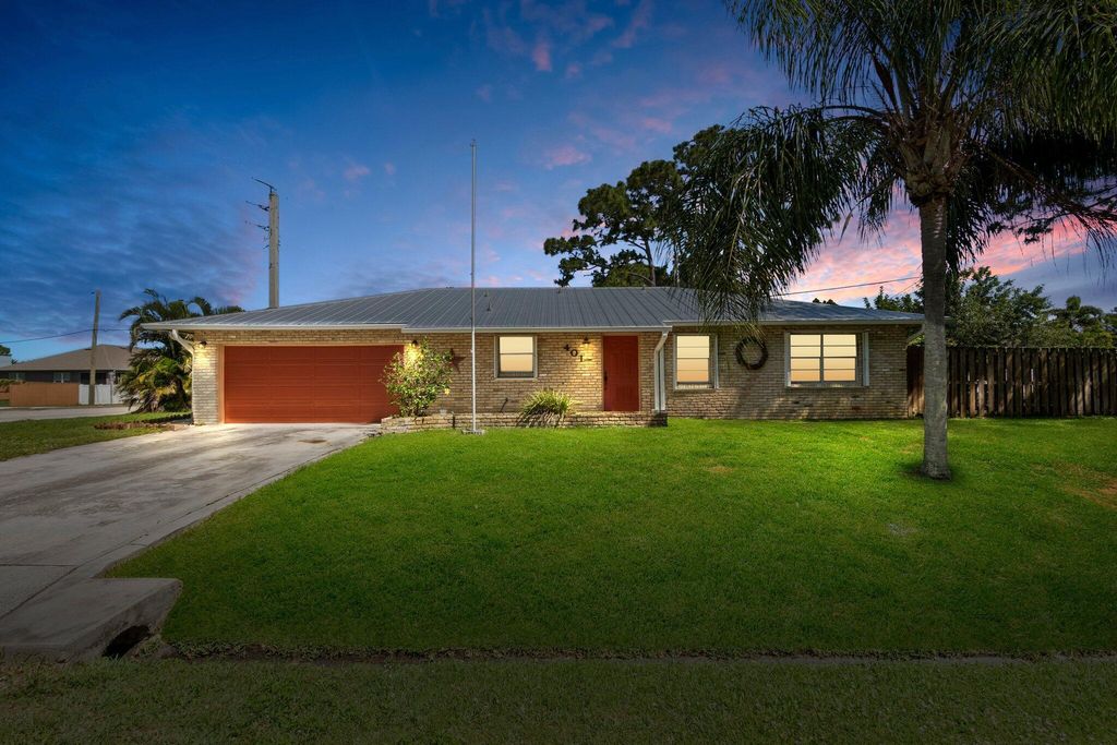 Photo of 401 SE Wallace Terrace, Port St Lucie, FL 34983 (MLS # R10892193)