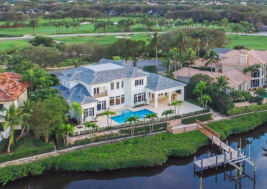 Absolutely stunning NEW custom built estate home in beautiful Admirals Cove. Over 7,600 of living SF. This grand and open floor plan includes 5 bedrooms on suite, 6 1/2 baths, First floor master suite, gourmet kitchen, formal living and dining room, executive study with wood floors and built in cabinetry. Two laundry rooms, Crestron lighting system, Custom wood trim and paneling throughout. Beautiful outdoor pool/spa with covered loggia with built in grill perfect for the entertainer.    Located in a quite cul-de-sac between beautiful water and golf course views, walking distance to the club house, tennis complex and marina.