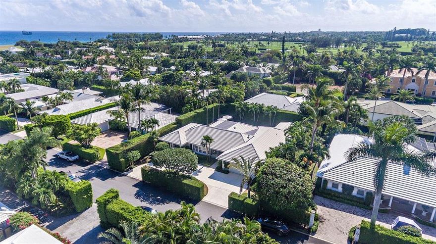 Location, Elevation, Exposure.  Southern facing home situated high up on a desirable North End Street. This truly is the only property like it on the market today.  A rare opportunity to be able to purchase a home on the North End and be able to move right in.  Single story living with split floorplan featuring 4 bedrooms along with 5.5 baths.  Brand new kitchen featuring luxury appliances flanked by multiple sitting areas.  Outdoor features include sunny Southern exposure along with a poolside cabana and dramatic ficus hedge.  This home is in MINT condition and won't last long.