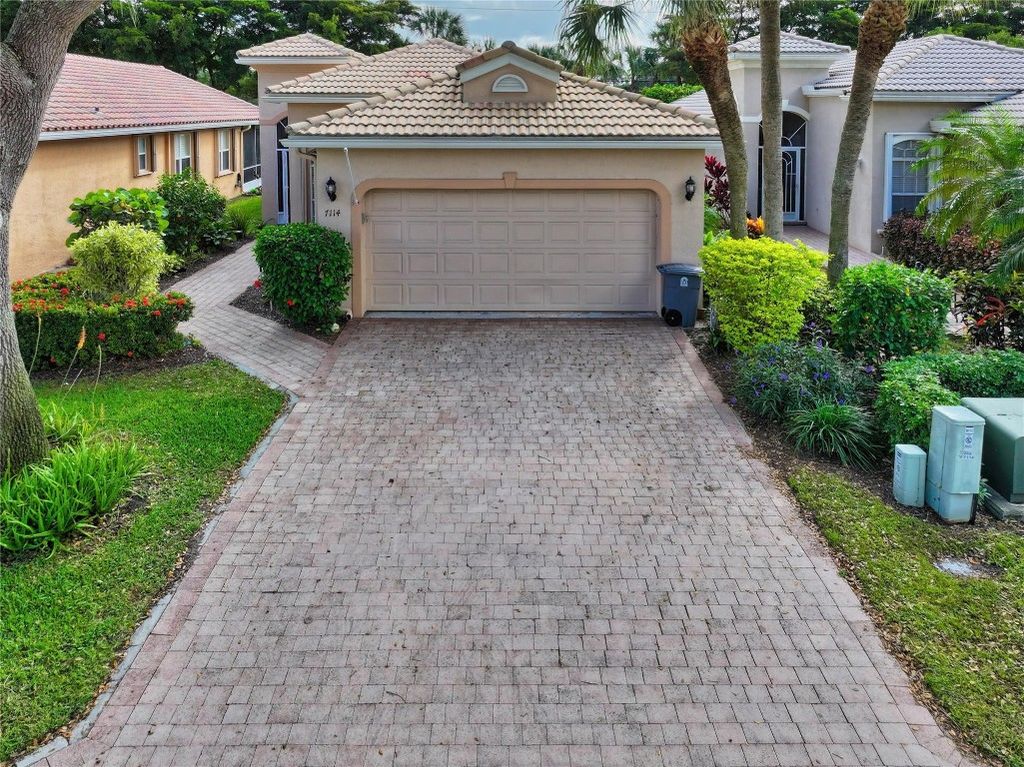 Photo of 7114 Via Genova, Delray Beach, FL 33446 (MLS # F10458336)