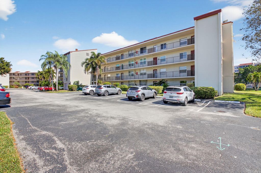 Photo of 27 Abbey Lane #207, Delray Beach, FL 33446 (MLS # R11159287)