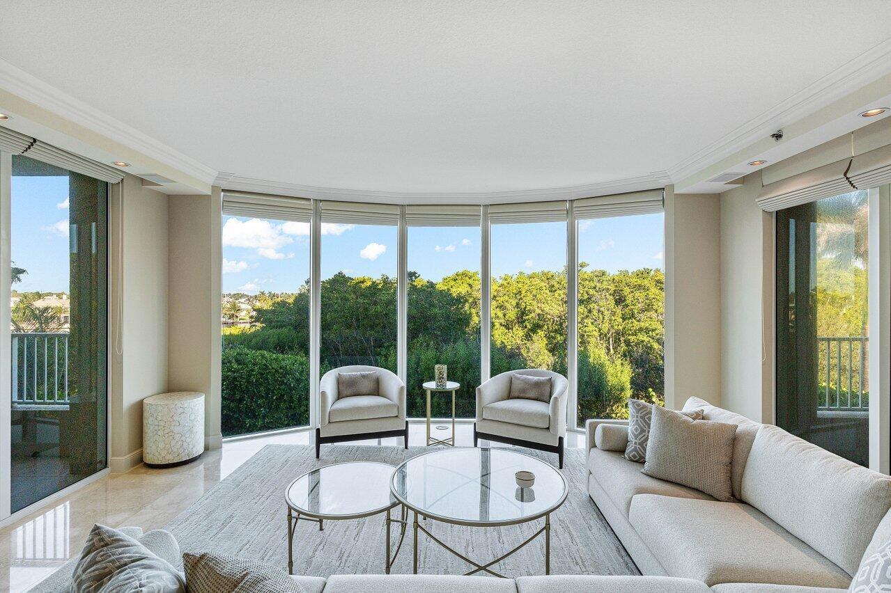 INTRODUCING THE GRAND FIRENZE, TOSCANA'S LARGEST 3-BDRM, CORNER FLOOR PLAN! Enter from your private elevator landing into your Residence and from the moment you arrive, you'll experience the walls of glass unique to Toscana's corner residences, with natural light beaming through all main living spaces. Thoughtfully designed and exceptionally cared for, this Grand Firenze model offers 3 bedrooms, 3.5 bathrooms, and two (2) covered garage spaces. Expansive open balconies extend the luxurious living space, providing the perfect spot to relax and take in the serene Intracoastal views and breathtaking sunsets. Every detail of Residence 308 has been carefully curated and designed.