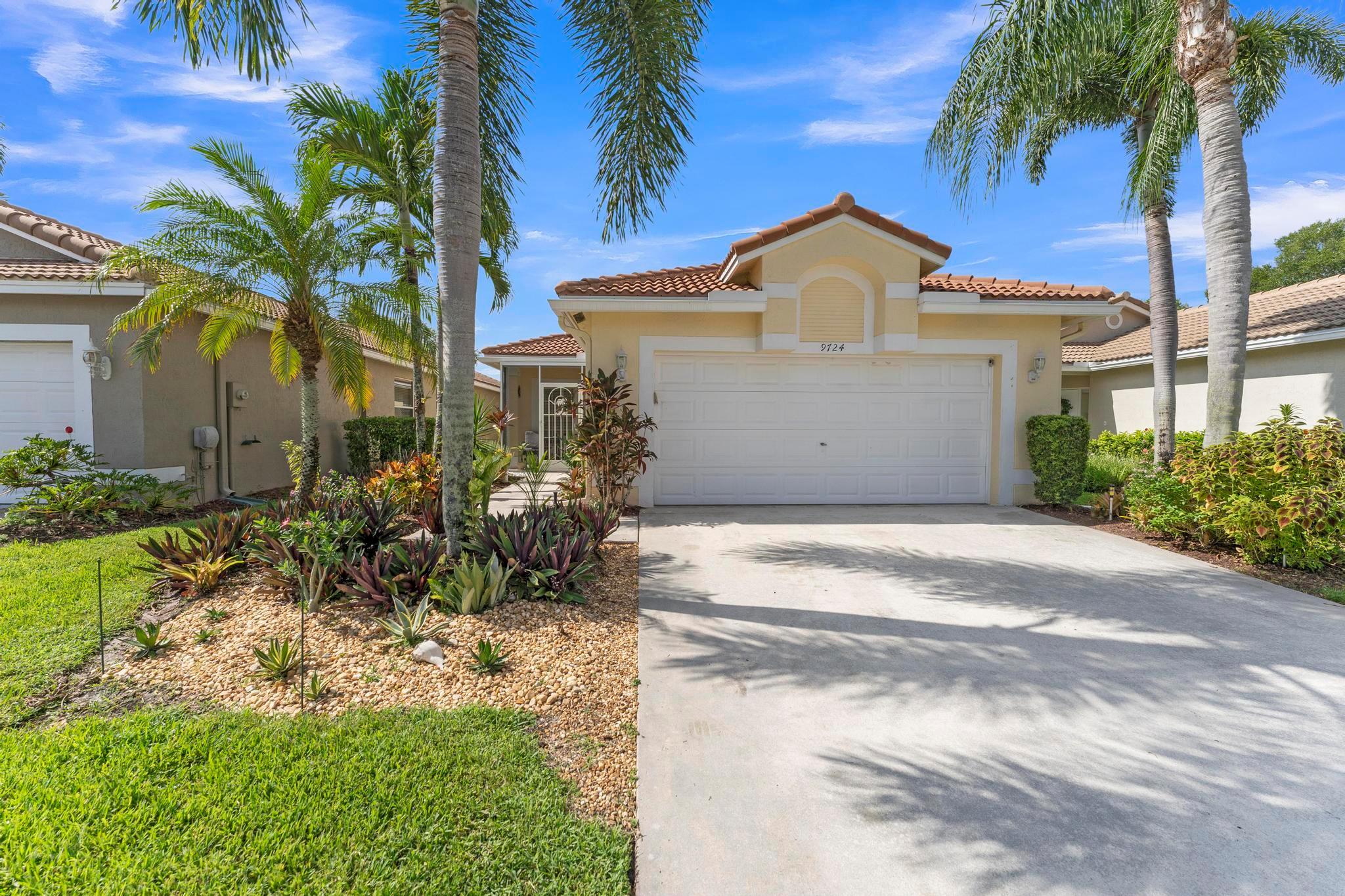Welcome to The Grove, one of Boynton Beach's most sought-after active communities! Enjoy a newly remodeled clubhouse with nonstop activities--shows, clubs, fitness, cards, arts & crafts, pickleball, tennis, bocce, putting green & an Olympic-size pool. The community is beautifully landscaped & perfectly located near West Boynton Hospital, Town Commons, and Whole Foods. This 3-bedroom, 2-bathroom home with a den features spacious living areas, an updated kitchen with stainless steel appliances, granite countertops, volume ceilings, and a screened patio overlooking a private garden just steps away from the Clubhouse.