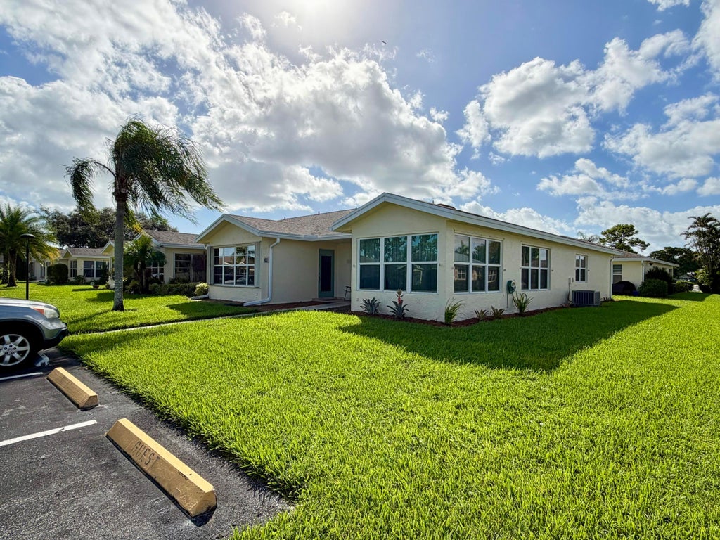 Photo of 5289 LAKEFRONT Boulevard #C, Delray Beach, FL 33484 (MLS # B26091935)