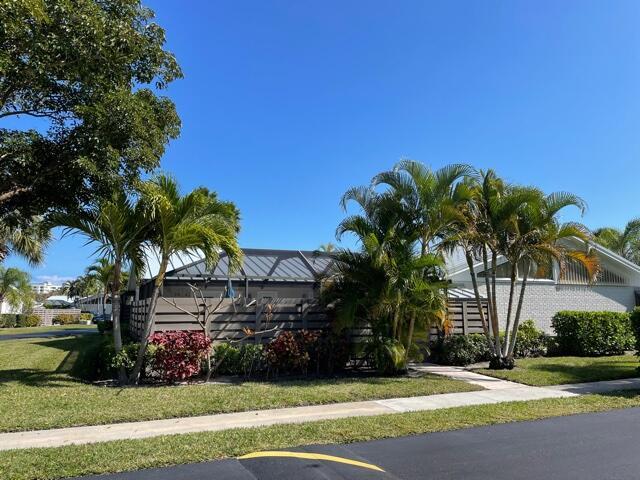 Walk to the turquoise waters of Jupiter Beach from charming one level villa offering 2 bedroom & 2 full baths. Relax on the HUGH screened porch, perfect for grilling and entertaining. Queen bed in Primary, 2 twins in guest bedroom. Both baths recently updated; full sized washer & dryer. Quite, gated beachside neighborhood with community pool. Walk to the beach, Riverwalk, shops & restaurants.