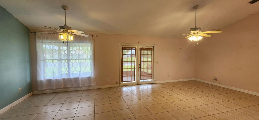 Photo of 2557 SE Lyman Circle, Port Saint Lucie, FL 34952 (MLS # R11103677)