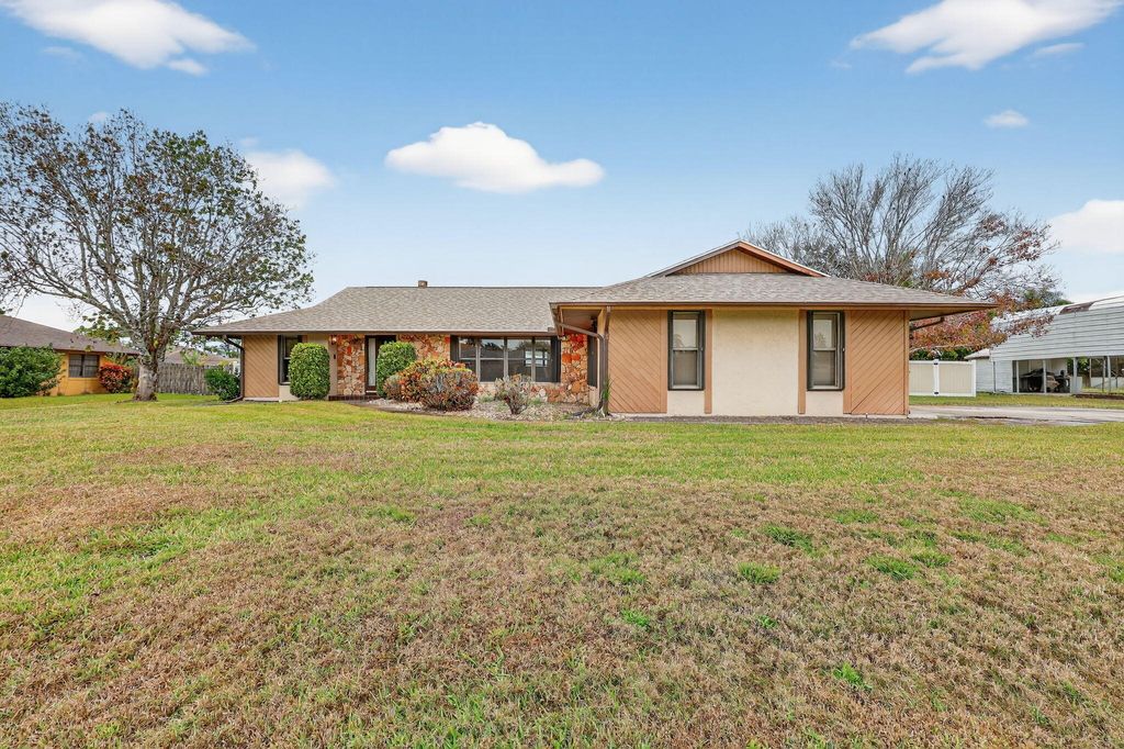 Photo of 1543 SE Chiffon Avenue, Port Saint Lucie, FL 34952 (MLS # R11159685)