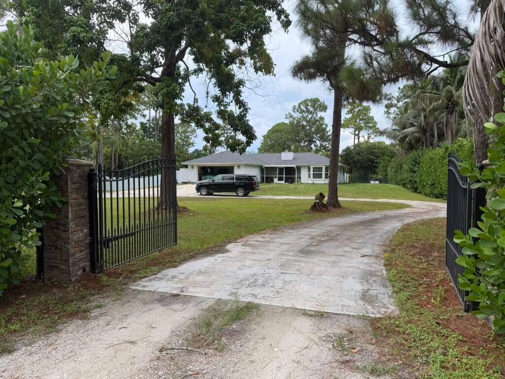 Photo of 11885 52ND Road N, The Acreage, FL 33411 (MLS # B26064724)