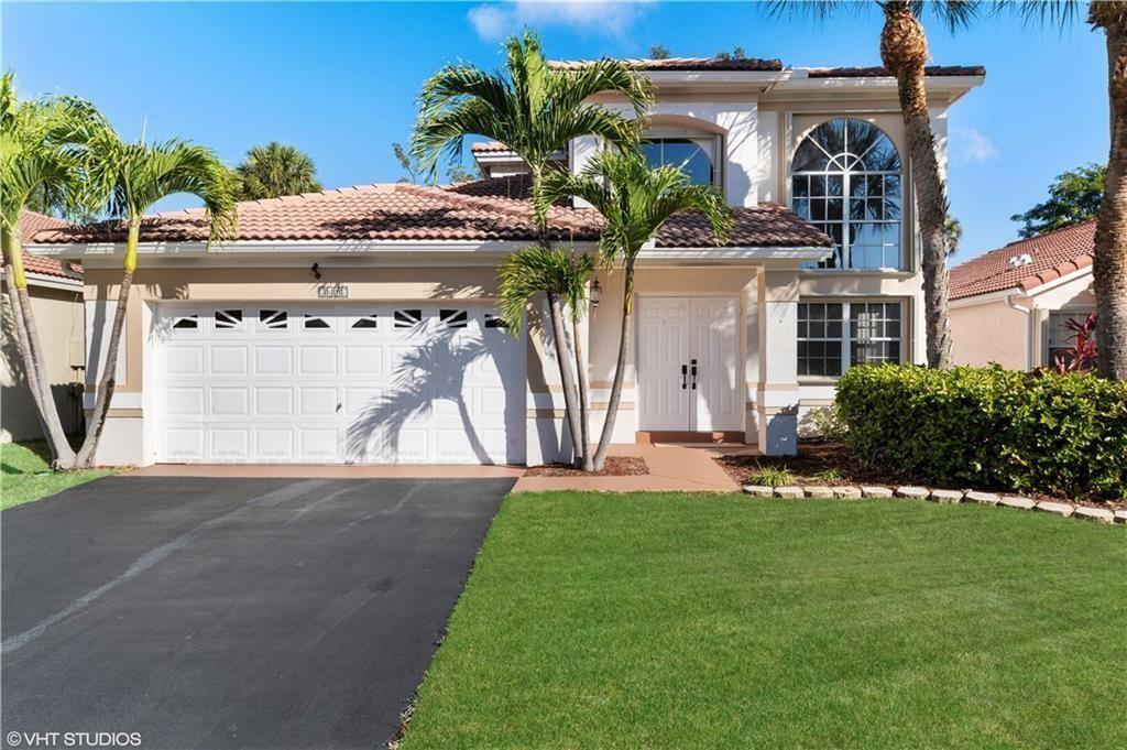 Welcome to Holiday Springs Village located in the heart of Margate, Florida. This spacious 3 bedroom, 2 bathroom home offers 2,074 sqft of living space, perfect for families or those looking for a little extra room to spread out. The open kitchen space is ideal for entertaining guests or preparing meals for your loved ones. The 2 car garage provides ample space for parking and storage. With accordion hurricane shutters, you can rest easy knowing your home is protected during storm season. Don't miss out on the opportunity to make this warm and inviting property your own