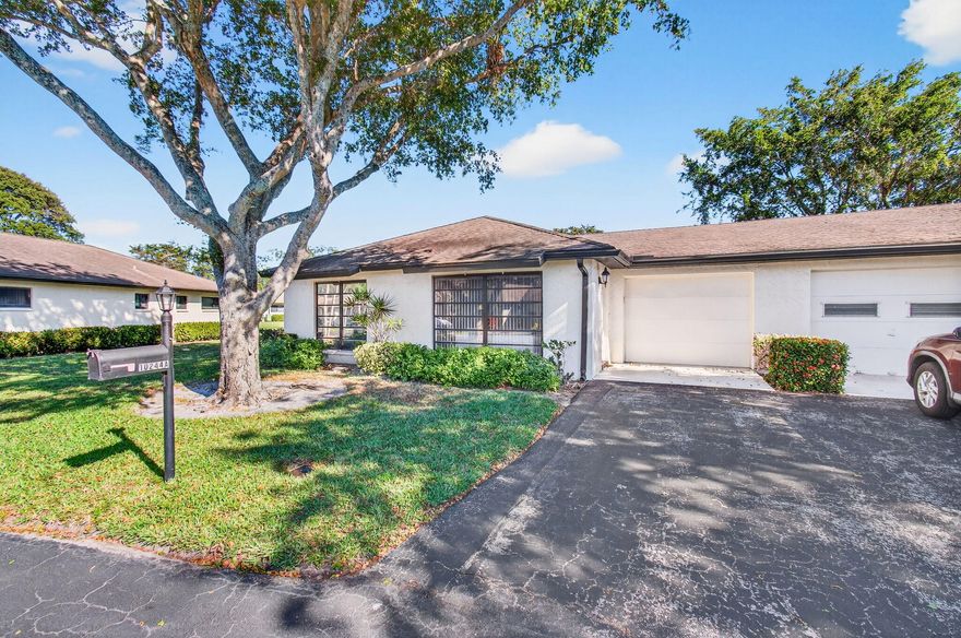 Bright, open layout with a large living area and an enclosed Florida room for relaxing or entertaining. This 1,400 sq ft villa feels like a home with an attached 1-car garage, 2 bedrooms, 2 baths, located on a peaceful cul-de-sac near the pool in the most popular 55+ community in Palm Beach County. Centrally located to shopping, parks, golf, restaurants, FL Turnpike, and a short drive to the beach.