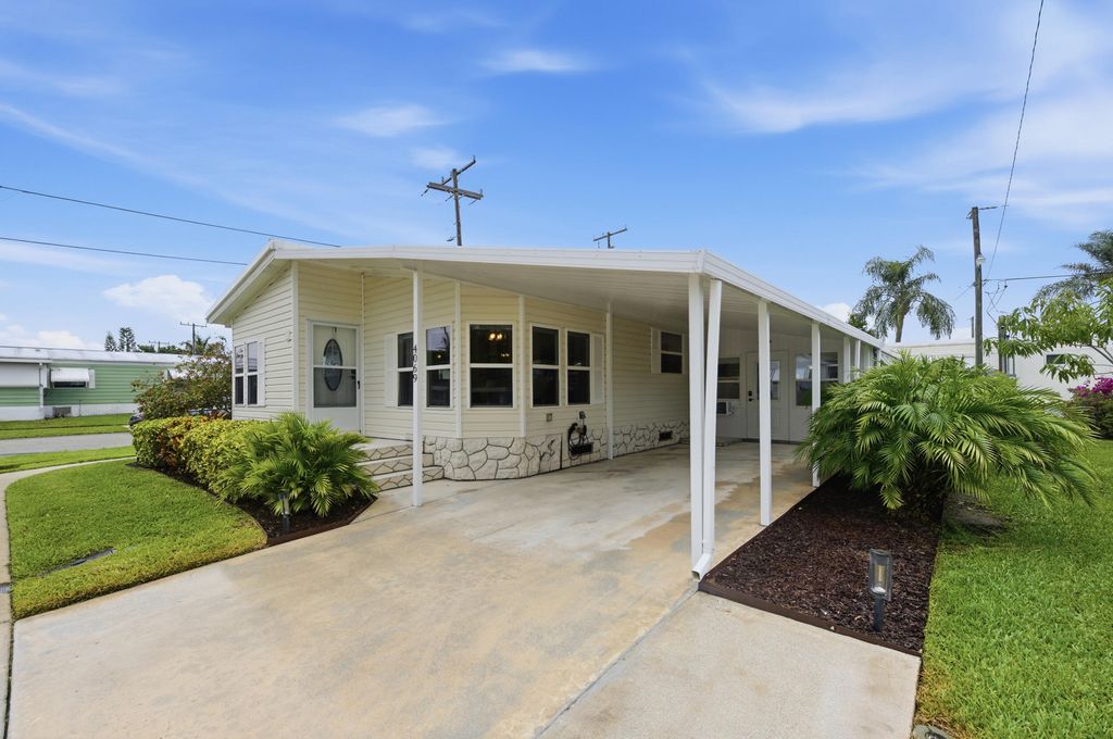 Photo of 4069 Mission Bell Drive, Boynton Beach, FL 33436 (MLS # B26018323)