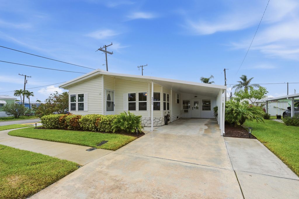 Photo of 4069 Mission Bell Drive, Boynton Beach, FL 33436 (MLS # B26018323)