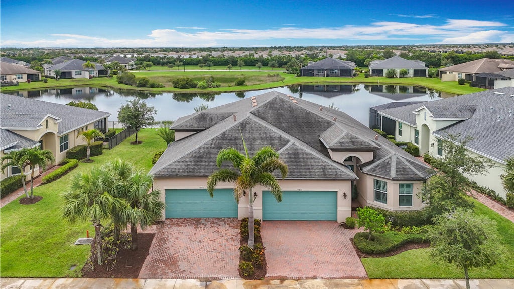 Photo of 11066 SW Sunrise Lake Drive, Port Saint Lucie, FL 34987 (MLS # R11096373)
