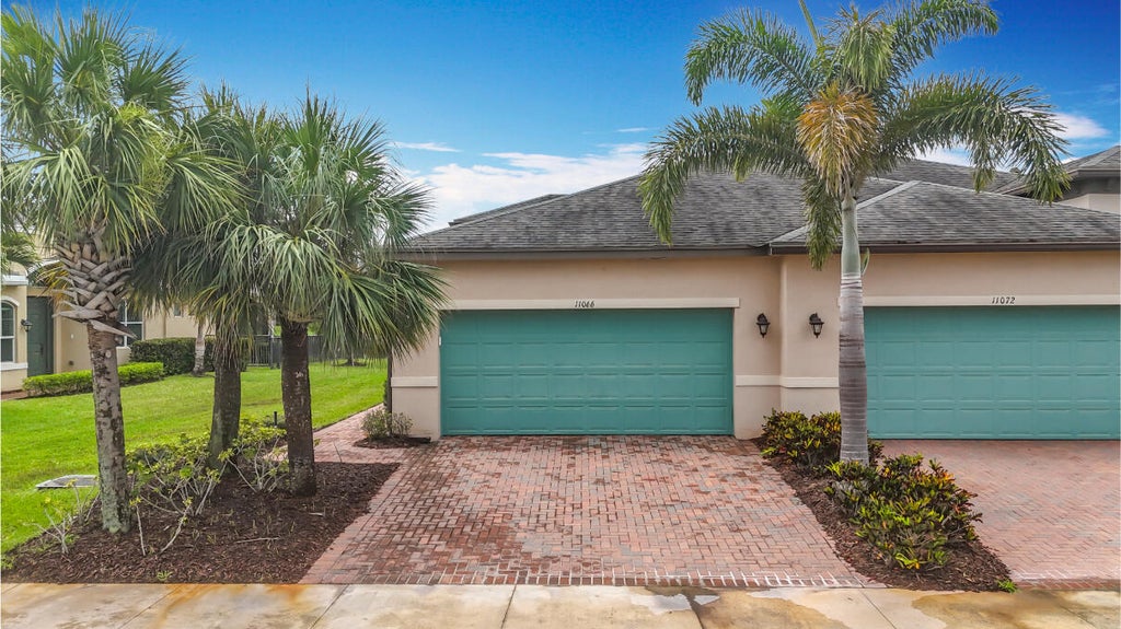 Photo of 11066 SW Sunrise Lake Drive, Port Saint Lucie, FL 34987 (MLS # R11096373)