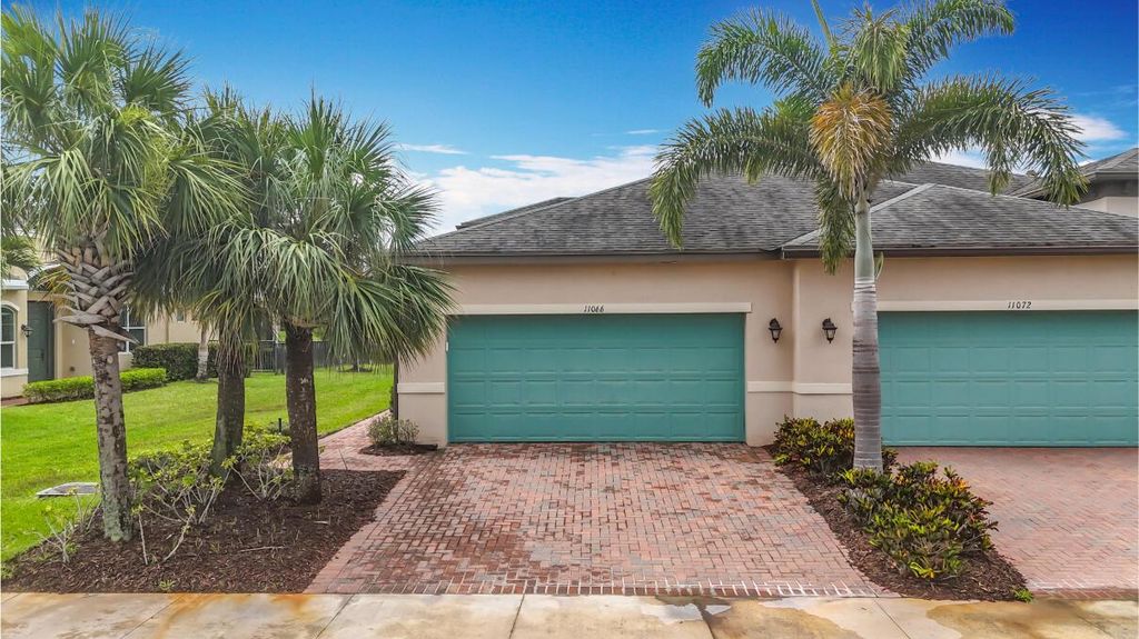 Photo of 11066 SW Sunrise Lake Drive, Port Saint Lucie, FL 34987 (MLS # R11096373)
