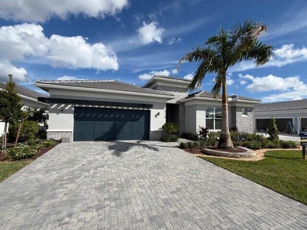 Photo of 10120 Timber Creek Way, Palm Beach Gardens, FL 33412 (MLS # R11139125)