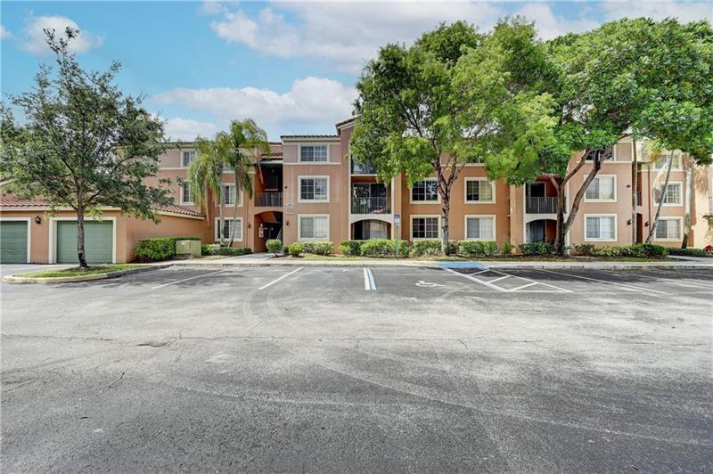 Calling all investors! Unit rented for $2000 until June 2024. Located in Coconut Creek most desirable community offering Resort style life style, few steps away from Shopping, Dining and Entertainment area including the Promenade of CC. This elegant 2nd floor, 2bd/1bath corner unit, adjacent to the clubhouse, offers nice upgraded flooring in living & Dining, great updated Kitchen. Master has XL walk-in closet.. Patio. Lots of windows. One carport & one assigned parking space. Condo fees include Security, Water,Cable, Gym, Pool, Tennis,+ much more. One pets under 40 lbs. Unit comes with an additional carport.