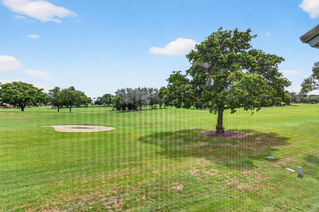 Photo of 11618 Briarwood Circle #4, Boynton Beach, FL 33437 (MLS # R11128266)