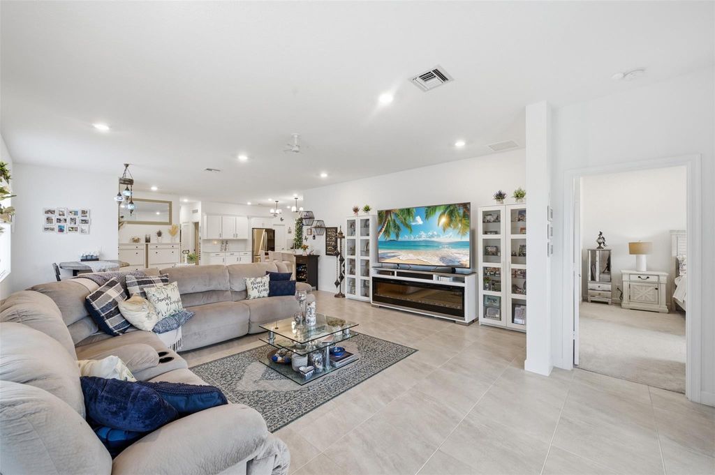 Photo of 1279 Tangled Orchard Trace #1279, The Acreage, FL 33470 (MLS # B26019172)